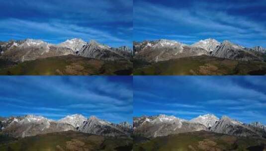 蓝天白云下的玉龙雪山延时拍摄高清在线视频素材下载