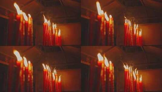 红色蜡烛点燃燃烧火焰寺庙高清在线视频素材下载