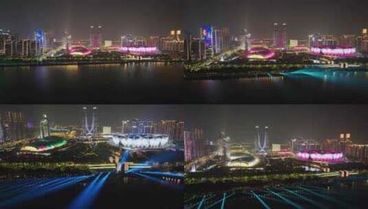杭州奥体中心杭州之门灯光秀夜晚夜景航拍亚高清在线视频素材下载