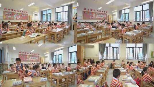 小学教室场景，学生们坐在课桌前高清在线视频素材下载