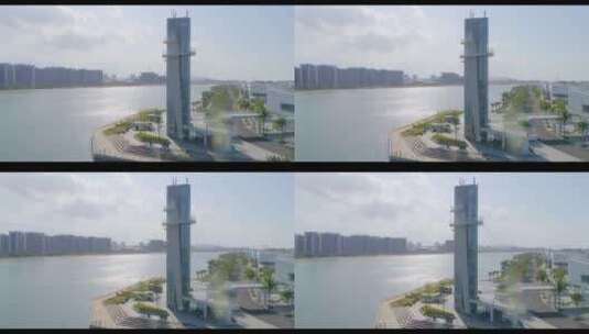 现代感未来感的建筑物江边高塔钟楼江景高清在线视频素材下载