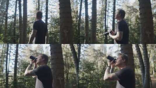 一个人在树林里散步并拍照高清在线视频素材下载