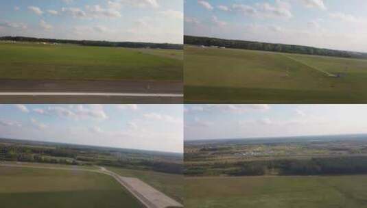 航拍飞机滑行道两边的风景高清在线视频素材下载