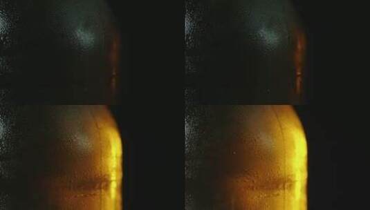 冰镇啤酒瓶表面的水珠特写高清在线视频素材下载