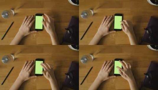 在桌子上使用手机的手高清在线视频素材下载
