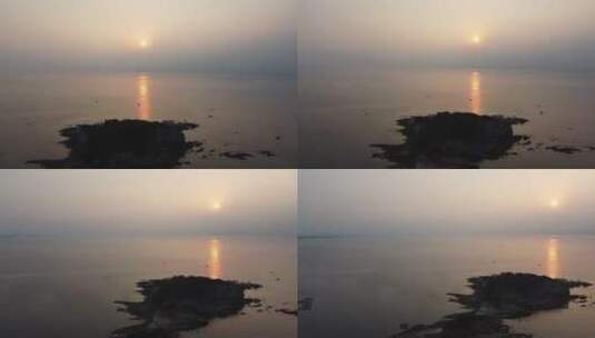 航拍山东威海海边小石岛日落风光高清在线视频素材下载