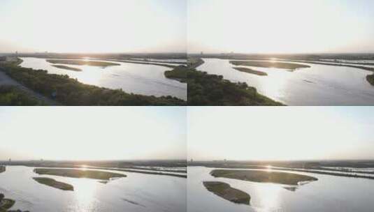 航拍夕阳下的河道高清在线视频素材下载