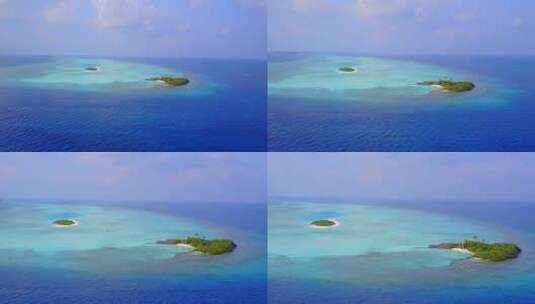 航拍蓝色的海洋和海上岛屿高清在线视频素材下载