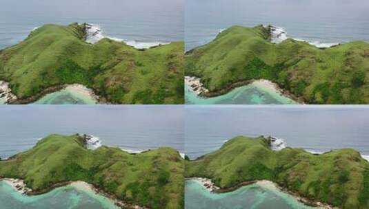 阴天，空中放大Bukit Merese Lombok的岩石白色沙滩高清在线视频素材下载
