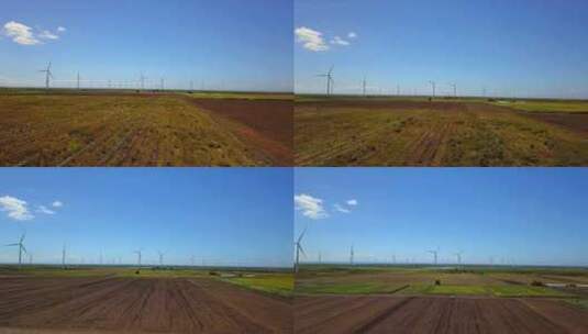 在风电场的田野里嗡嗡作响。高清在线视频素材下载