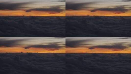 飞机云层之上，日出的时刻高清在线视频素材下载