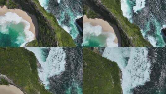 航拍印尼巴厘岛热带雨林悬崖下的绿松石海水高清在线视频素材下载
