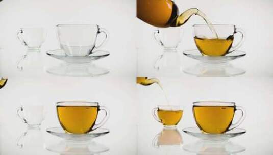 倒茶。茶倒入玻璃透明茶杯。喝茶时间。透明高清在线视频素材下载