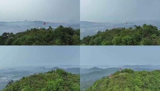 山顶旗帜航拍山峰红旗山顶国旗登顶成功旗子高清在线视频素材下载