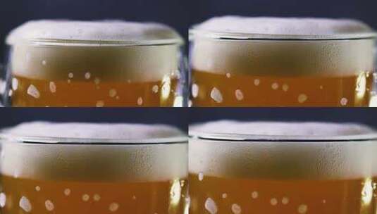 啤酒泡沫溢出啤酒杯高清在线视频素材下载