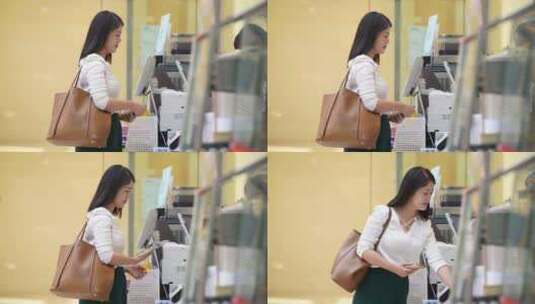 女性超市购物手机扫码支付高清在线视频素材下载