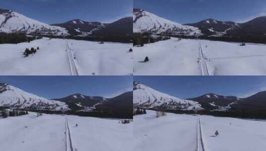 航拍新疆冬季喀纳斯河流晨雾雪山森林雪景高清在线视频素材下载