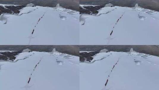 航拍冰川之父慕士塔格峰雪山冰川上的登山队高清在线视频素材下载