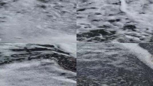 海浪冲刷沙滩的特写镜头高清在线视频素材下载