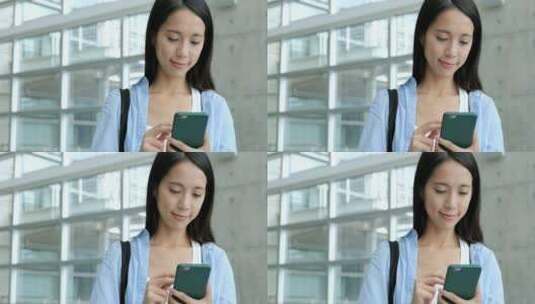 浏览手机的亚洲女孩高清在线视频素材下载