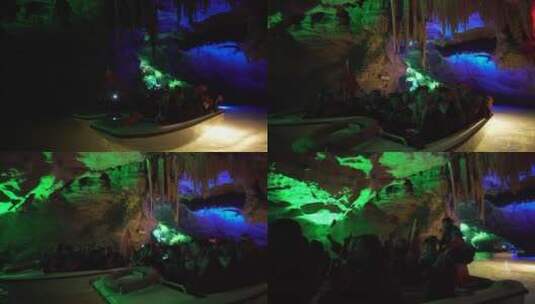 洞穴中乘船游览的游客高清在线视频素材下载