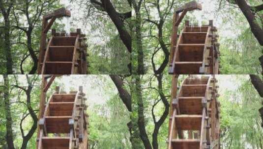 移动镜头北京大观园内的仿古水车高清在线视频素材下载