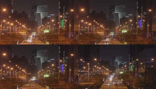 300焦段央视塔楼前家交通车流夜景视频高清在线视频素材下载