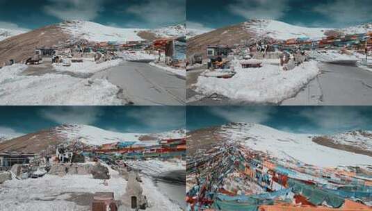 西藏旅游风光318国道米拉山口经幡雪山白雪高清在线视频素材下载
