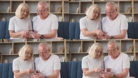 老年夫妇坐在沙发上选择药丸高清在线视频素材下载