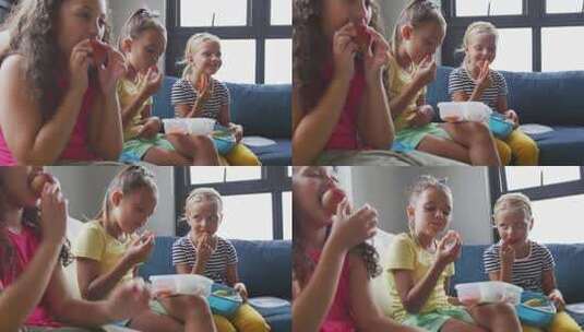 女孩在学校公共休息室吃饭高清在线视频素材下载