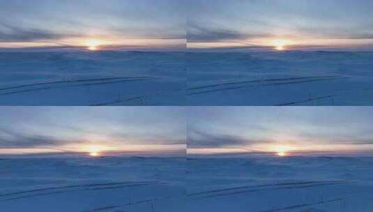 航拍冬日呼伦贝尔冰雪草原暮色高清在线视频素材下载