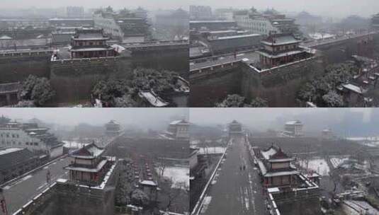 西安城墙敌楼雪景航拍高清在线视频素材下载