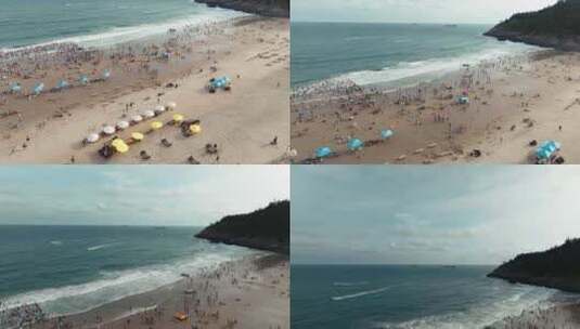 航拍海边白色沙滩游客游玩度假高清在线视频素材下载
