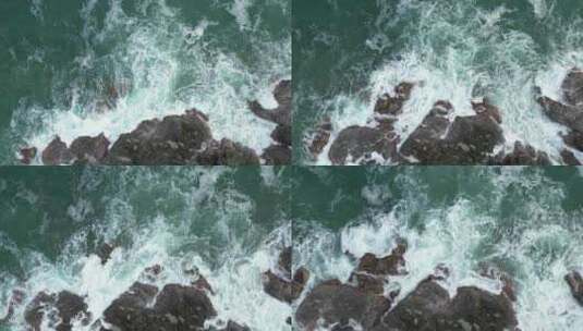 沿海海浪拍打礁石水花航拍俯拍4K高清在线视频素材下载