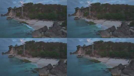HDR印尼巴厘岛悬崖阿雅娜海滨自然风光航拍高清在线视频素材下载