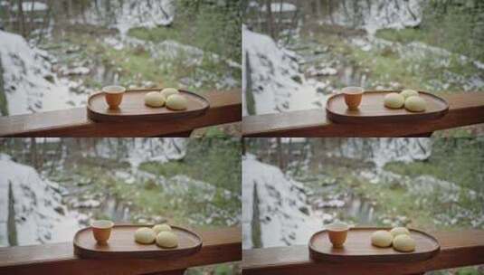 雪天户外喝茶吃糕点心享受生活高清在线视频素材下载