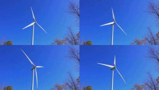 风力涡轮机在阳光明媚的秋日运行。高清在线视频素材下载