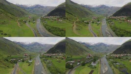 高加索山脉一条公路的宽无人机照片，远处是高清在线视频素材下载