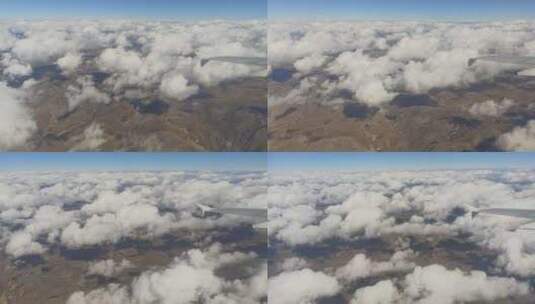 飞机窗外看川藏高原和云海高清在线视频素材下载