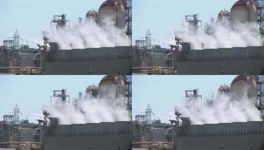 蒸汽从发电厂的烟囱中升起高清在线视频素材下载