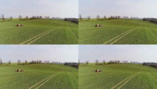 拖拉机在田间喷施农药高清在线视频素材下载