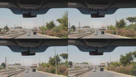 从巴士的前窗拍摄的行驶道路高清在线视频素材下载