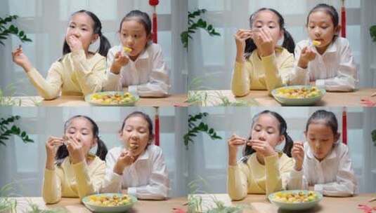 两个休息吃水果的中国女孩高清在线视频素材下载