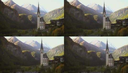 教堂塔楼和山脉景观高清在线视频素材下载
