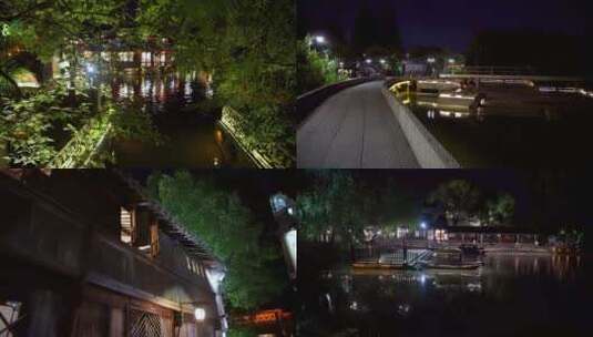 嘉兴乌镇西栅建筑划船夜景4K风景视频高清在线视频素材下载