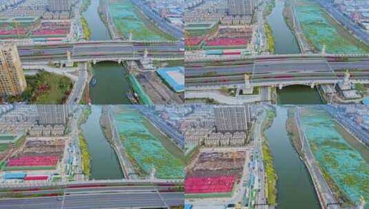 航拍江苏盐城新都路桥梁现代城市风景高清在线视频素材下载