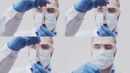 医生观察抽血管血液状态高清在线视频素材下载
