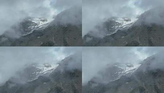 航拍阿坝岷山山脉四根香峰雪山云海高原风光高清在线视频素材下载