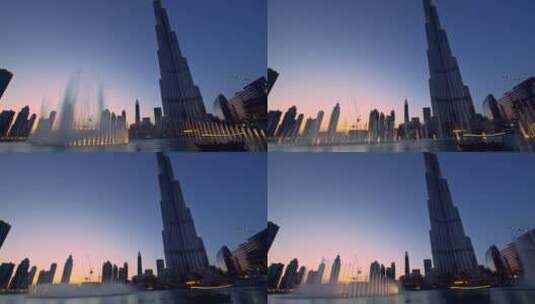清晨迪拜塔前的喷泉高清在线视频素材下载