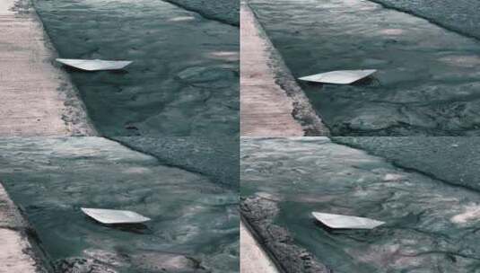 纸船漂浮在水渠上高清在线视频素材下载